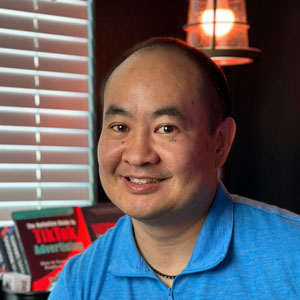 Portrait of Dennis Yu, co-founder of Local Service Spotlight