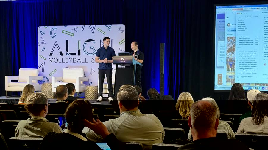 Dennis Yu and Dylan Haugen presenting on stage at the ALIGN Volleyball Summit