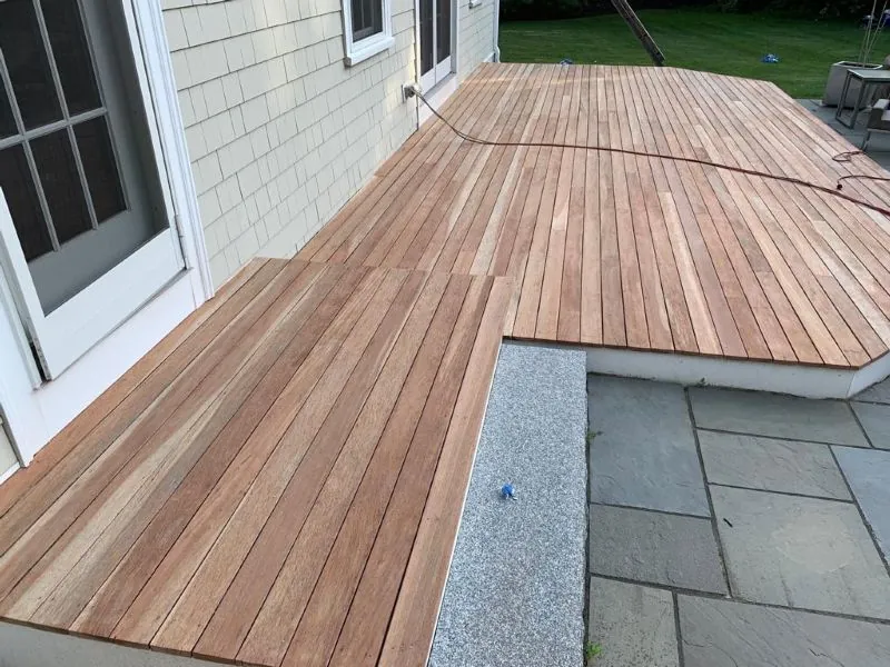 Mahogany deck stripped, sanded and stained — before