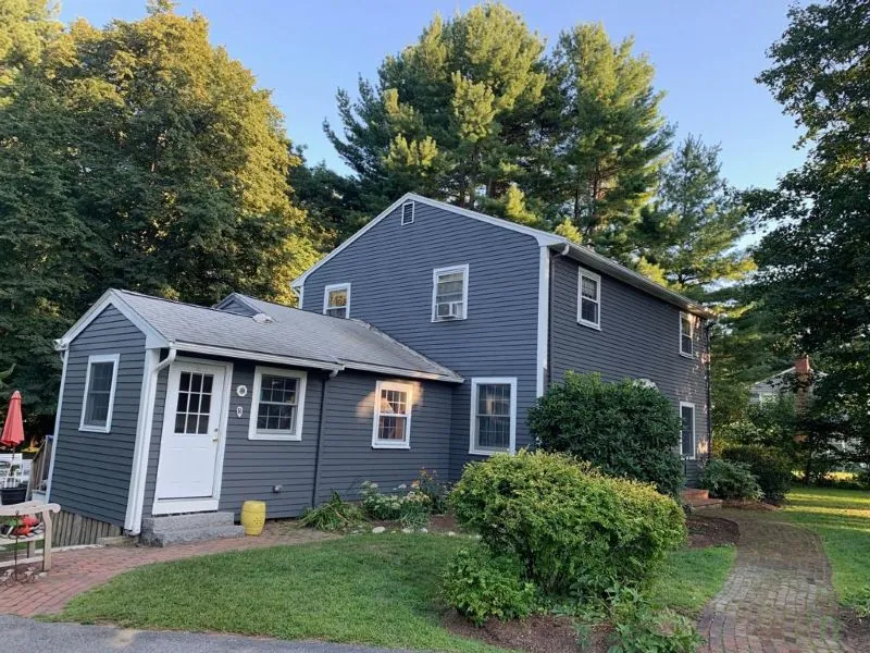 Slate-blue home exterior after a Target Painting color change
