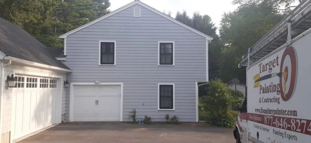 Failing siding stripped, repaired and repainted — after