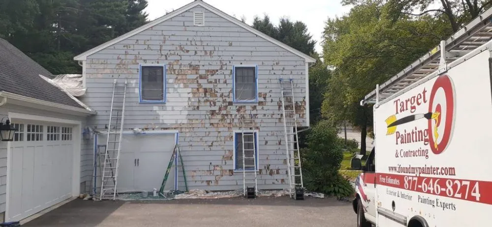 Failing siding stripped, repaired and repainted — before